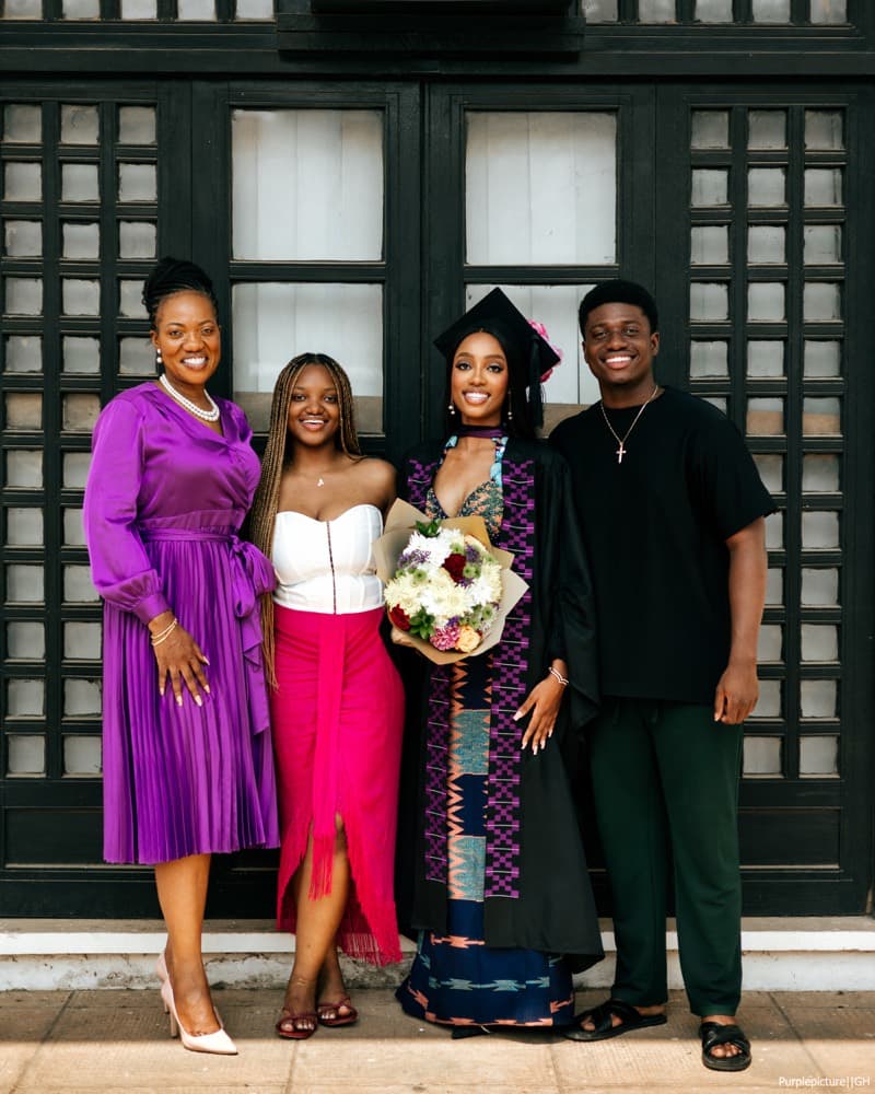Graduate with family after the ceremony